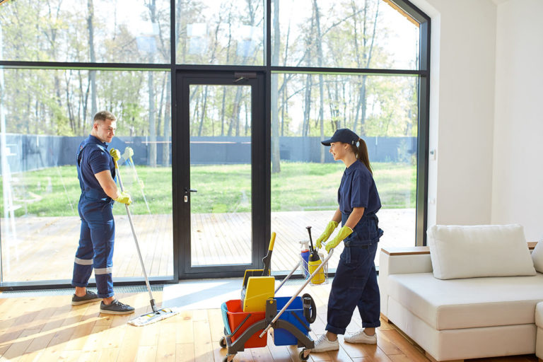 Two janitors cleaning | Cleaning Services Group, Inc.